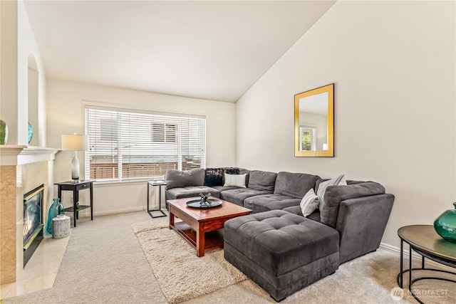 8221 53rd Ave W Unit 15C, Mukilteo, WA 98275 - carpeted living room featuring lofted ceiling and a premium fireplace