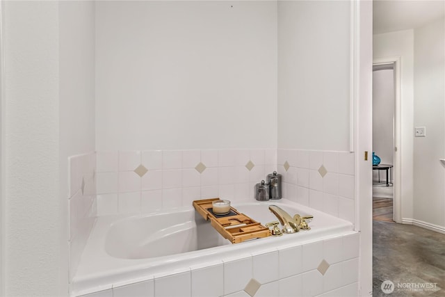 8221 53rd Ave W Unit 15C, Mukilteo, WA 98275 - bathroom with a garden tub and concrete flooring