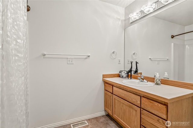 8221 53rd Ave W Unit 15C, Mukilteo, WA 98275 - bathroom featuring vanity, a shower with curtain, and tile patterned floors
