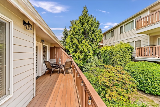 8221 53rd Ave W Unit 15C, Mukilteo, WA 98275 - wooden terrace with outdoor dining area