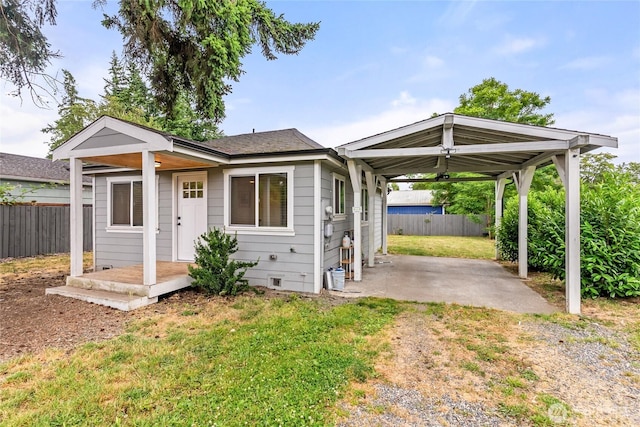 1902 72nd St E, Tacoma, WA 98404 - view of front facade featuring a fenced backyard and a patio