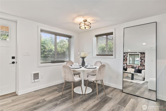 1902 72nd St E, Tacoma, WA 98404 - dining space with wood finished floors and heating unit