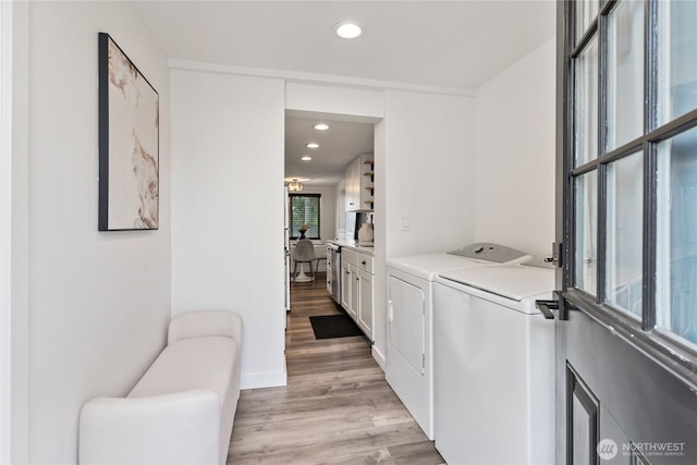 1902 72nd St E, Tacoma, WA 98404 - washroom with washing machine and dryer, light wood-style flooring, and recessed lighting