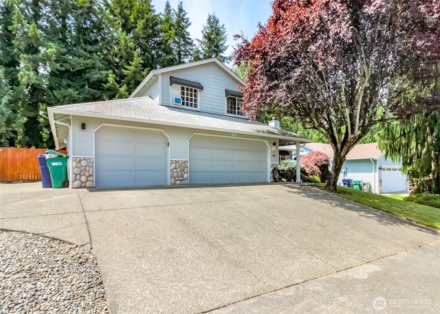 35459 25th Pl S, Federal Way, WA 98003 - view of front of home with driveway, stone siding, and a shingled roof
