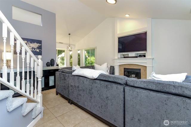 35459 25th Pl S, Federal Way, WA 98003 - living room featuring stairs, light tile patterned floors, a fireplace, high vaulted ceiling, and recessed lighting