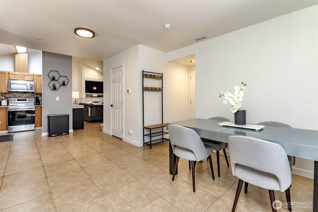 35459 25th Pl S, Federal Way, WA 98003 - dining area featuring light tile patterned floors and baseboards