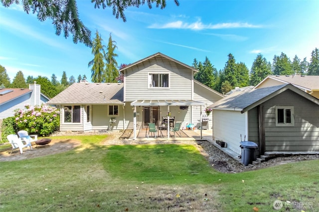 35459 25th Pl S, Federal Way, WA 98003 - rear view of property featuring an outdoor fire pit, a patio area, a yard, roof with shingles, and an outdoor structure