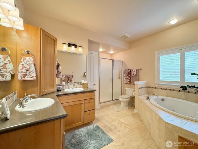 453 Louella Heights Dr, Sequim, WA 98382 - bathroom featuring a stall shower, two vanities, a whirlpool tub, and tile patterned floors