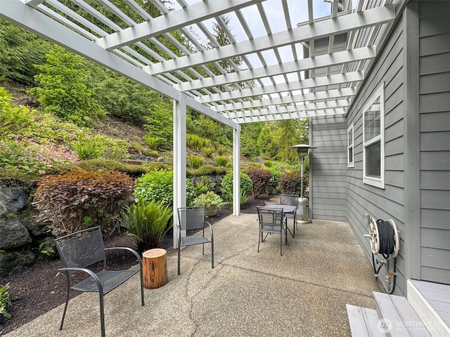453 Louella Heights Dr, Sequim, WA 98382 - view of patio featuring outdoor dining space and a pergola