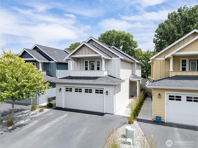 2452 NW Columbia Ave Unit 34, East Wenatchee, WA 98802 - craftsman house with board and batten siding, asphalt driveway, a garage, and a shingled roof