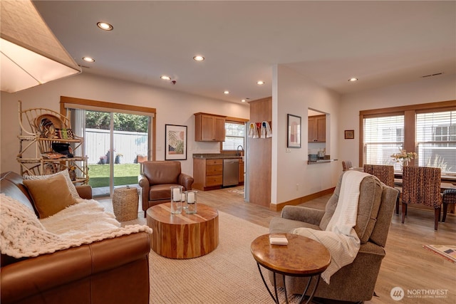 2452 NW Columbia Ave Unit 34, East Wenatchee, WA 98802 - living area featuring plenty of natural light, recessed lighting, and light wood-style flooring