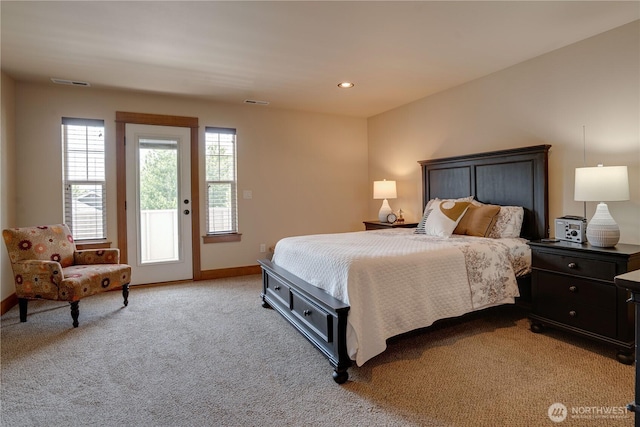 2452 NW Columbia Ave Unit 34, East Wenatchee, WA 98802 - bedroom featuring access to outside and light carpet