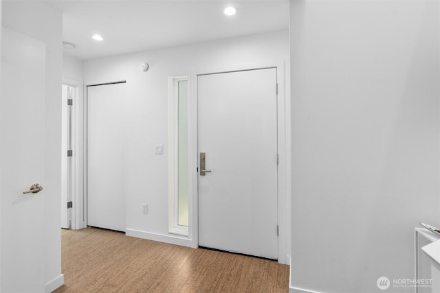 3642A Interlake Ave N, Seattle, WA 98103 - unfurnished bedroom with wood finished floors, recessed lighting, and two closets