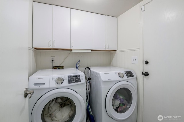 11011 203rd Ave E, Bonney Lake, WA 98391 - washroom featuring cabinet space and washer and clothes dryer