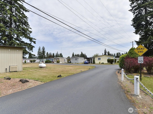 20725 9th Ave E Unit 6, Spanaway, WA 98387 - view of asphalt road with traffic signs