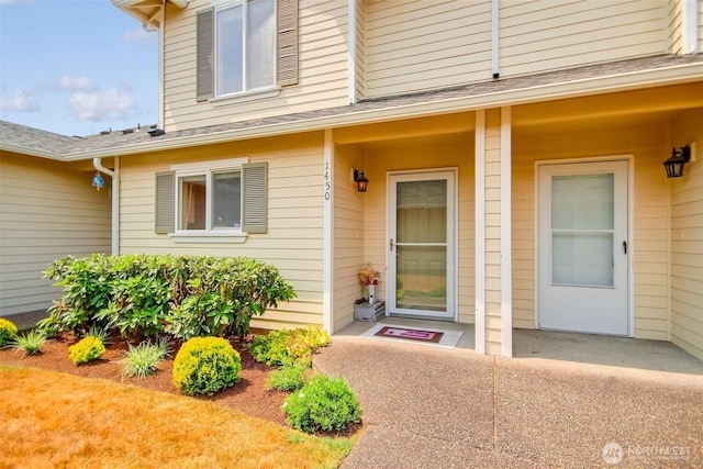 1450 Mountain View Dr, Enumclaw, WA 98022 - view of exterior entry featuring roof with shingles