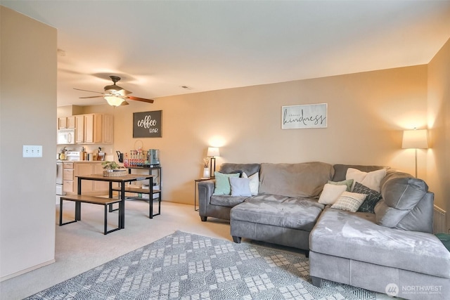 1450 Mountain View Dr, Enumclaw, WA 98022 - living room featuring a ceiling fan and light carpet
