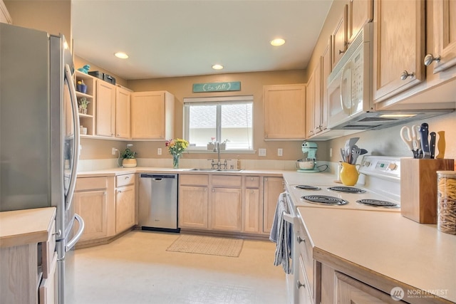 1450 Mountain View Dr, Enumclaw, WA 98022 - kitchen with appliances with stainless steel finishes, light brown cabinets, light countertops, and recessed lighting