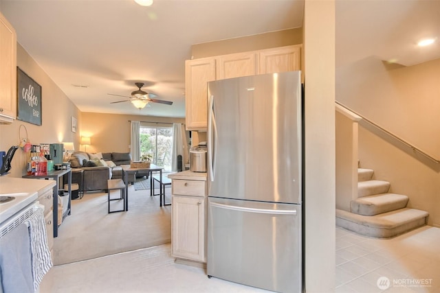 1450 Mountain View Dr, Enumclaw, WA 98022 - kitchen with freestanding refrigerator, ceiling fan, light countertops, open floor plan, and light brown cabinets