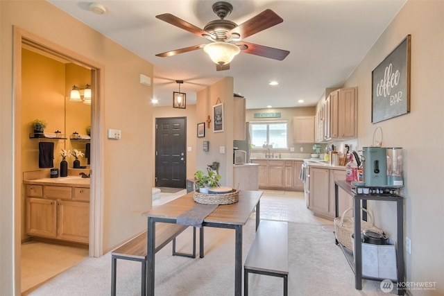 1450 Mountain View Dr, Enumclaw, WA 98022 - kitchen with electric stove, light countertops, ceiling fan, and light brown cabinets