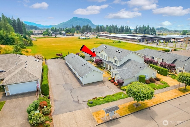 1450 Mountain View Dr, Enumclaw, WA 98022 - aerial view of residential area featuring a mountainous background