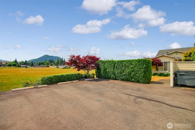 1450 Mountain View Dr, Enumclaw, WA 98022 - uncovered parking lot featuring a mountain view