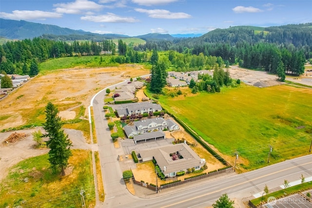 1450 Mountain View Dr, Enumclaw, WA 98022 - drone / aerial view of mountains and a heavily wooded area