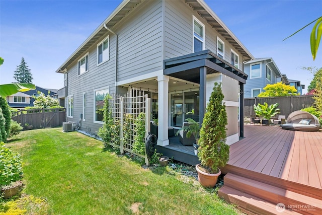 12914 SE 213th, Kent, WA 98031 - rear view of house with a deck and a fenced backyard
