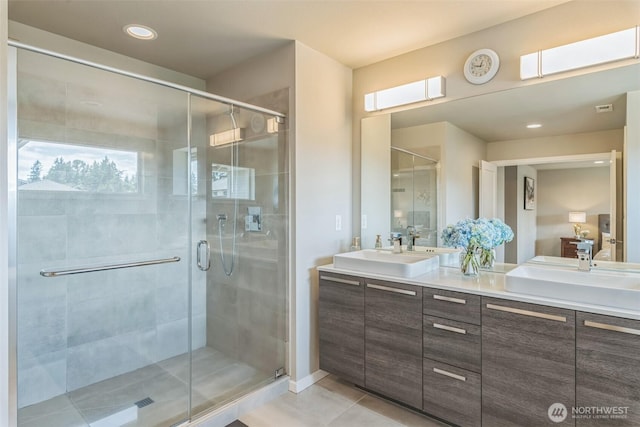 12914 SE 213th, Kent, WA 98031 - bathroom with double vanity, a stall shower, tile patterned flooring, and recessed lighting