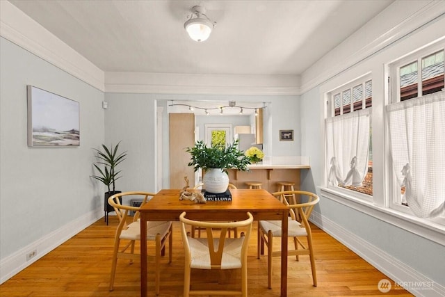 1305 N 6th St, Tacoma, WA 98403 - dining area featuring light wood finished floors and baseboards