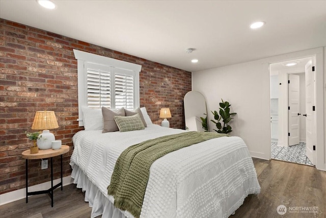 1305 N 6th St, Tacoma, WA 98403 - bedroom with wood finished floors, brick wall, and recessed lighting