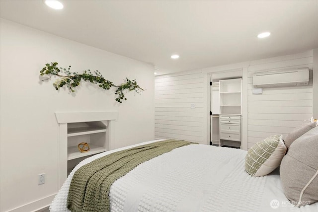 1305 N 6th St, Tacoma, WA 98403 - bedroom with a wall unit AC, recessed lighting, and a spacious closet