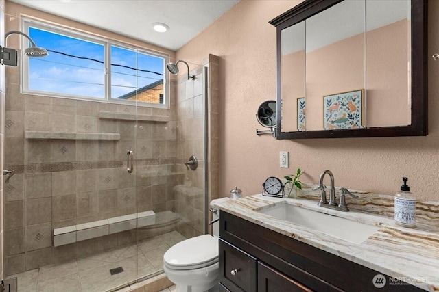 1305 N 6th St, Tacoma, WA 98403 - bathroom with a stall shower, vanity, and a textured wall
