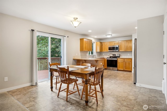 17712 E Clear Lake Blvd SE, Yelm, WA 98597 - dining area with baseboards and recessed lighting