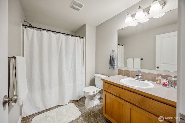 17712 E Clear Lake Blvd SE, Yelm, WA 98597 - full bathroom featuring vanity and stone finish flooring