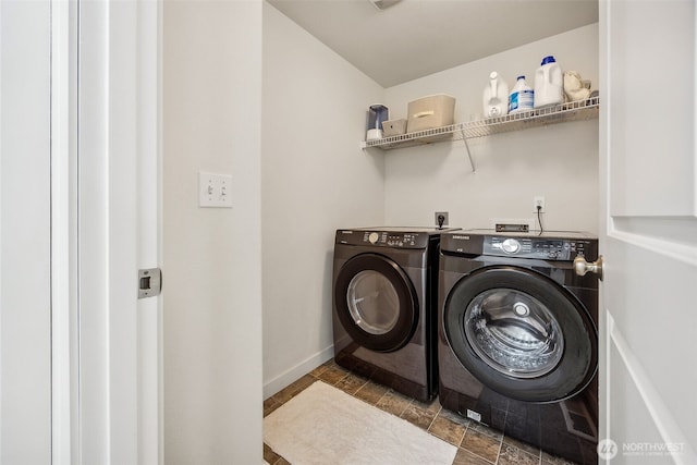 17712 E Clear Lake Blvd SE, Yelm, WA 98597 - washroom featuring washing machine and clothes dryer and baseboards