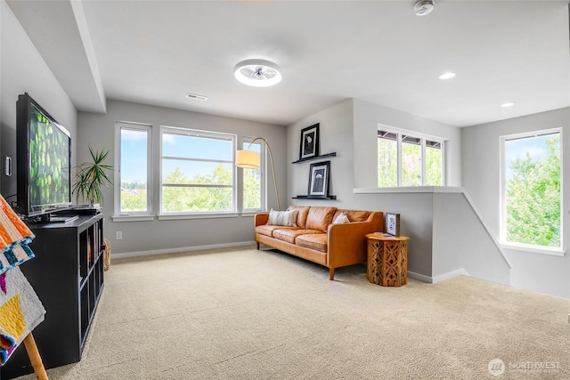 33025 Evergreen Ave SE, Black Diamond, WA 98010 - living area with light colored carpet, healthy amount of natural light, and recessed lighting