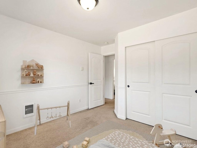 20008 99th Ave E, Graham, WA 98338 - unfurnished bedroom featuring carpet flooring, heating unit, and a closet