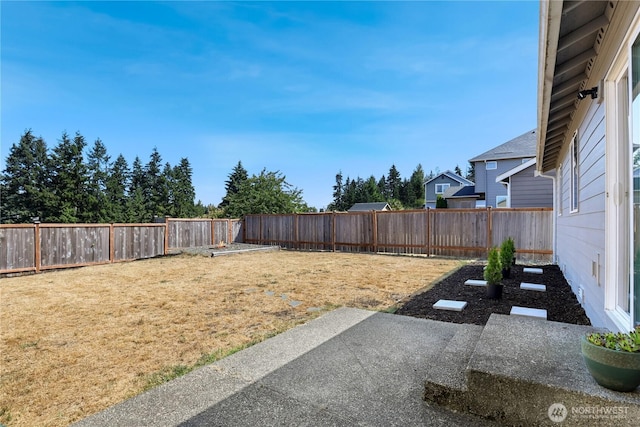 20008 99th Ave E, Graham, WA 98338 - fenced backyard with a patio area