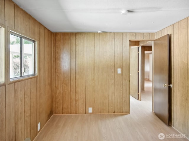 9128 184th Ave NE, Granite Falls, WA 98252 - spare room with light wood-type flooring, wooden walls, and a smoke detector