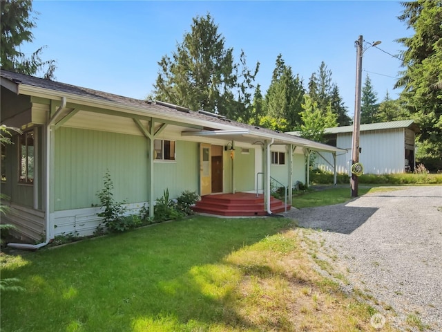 9128 184th Ave NE, Granite Falls, WA 98252 - view of front facade with a front lawn and a porch