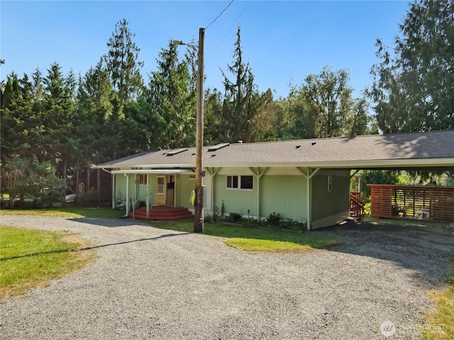 9128 184th Ave NE, Granite Falls, WA 98252 - single story home featuring gravel driveway and an attached carport