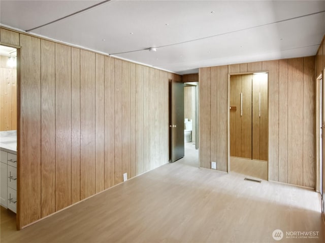 9128 184th Ave NE, Granite Falls, WA 98252 - unfurnished room featuring wooden walls and wood finished floors