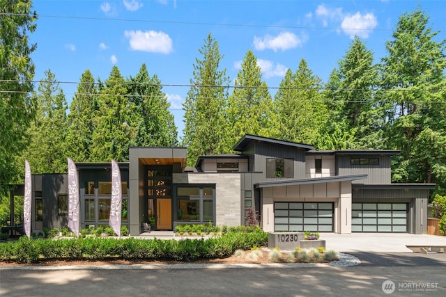 10230 SE 13th Pl, Bellevue, WA 98004 - modern home with driveway and an attached garage