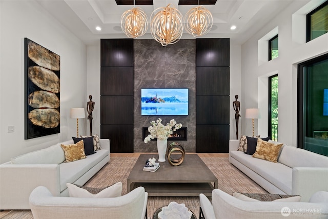 10230 SE 13th Pl, Bellevue, WA 98004 - living area with recessed lighting, a tiled fireplace, and wood finished floors