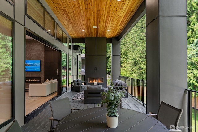 10230 SE 13th Pl, Bellevue, WA 98004 - sunroom featuring healthy amount of natural light