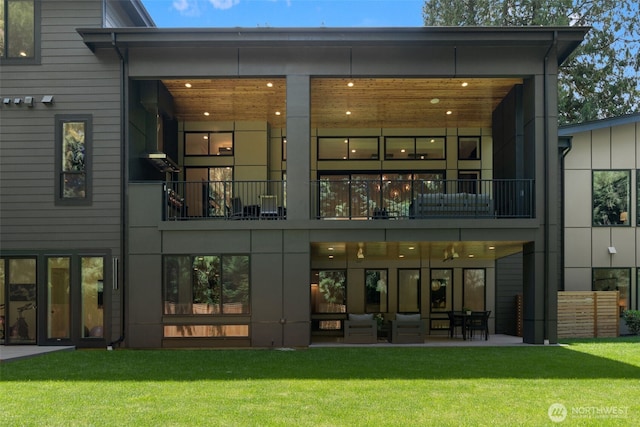 10230 SE 13th Pl, Bellevue, WA 98004 - back of property with a lawn, a balcony, and a patio
