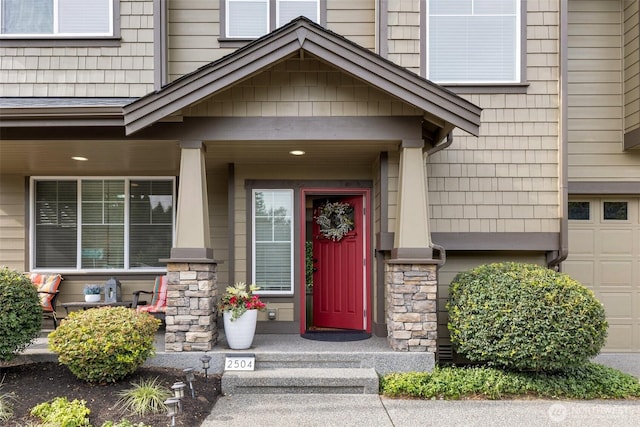 2504 NE 24th Pl, Renton, WA 98056 - entrance to property featuring a garage and stone siding