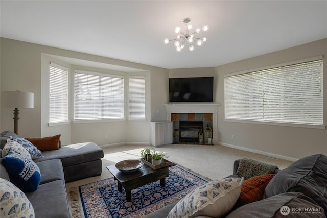 2504 NE 24th Pl, Renton, WA 98056 - living area with light colored carpet, plenty of natural light, a chandelier, and a fireplace