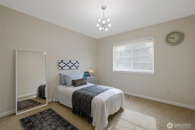 2504 NE 24th Pl, Renton, WA 98056 - carpeted bedroom featuring a chandelier and baseboards